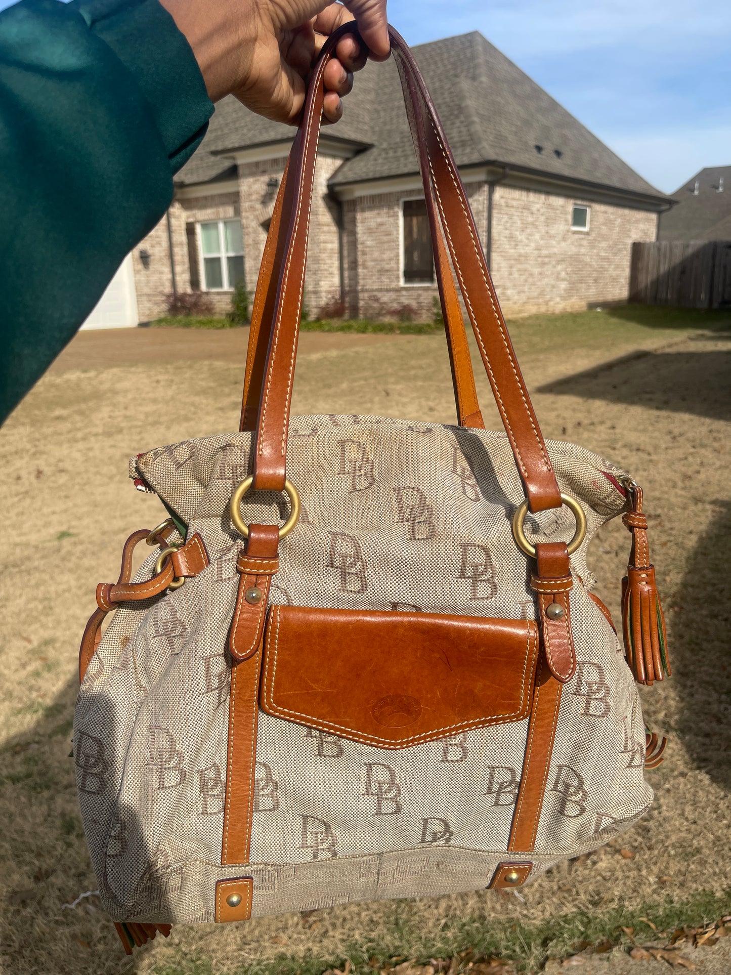 Dooney & Bourke brown handbag (need little cleaning)