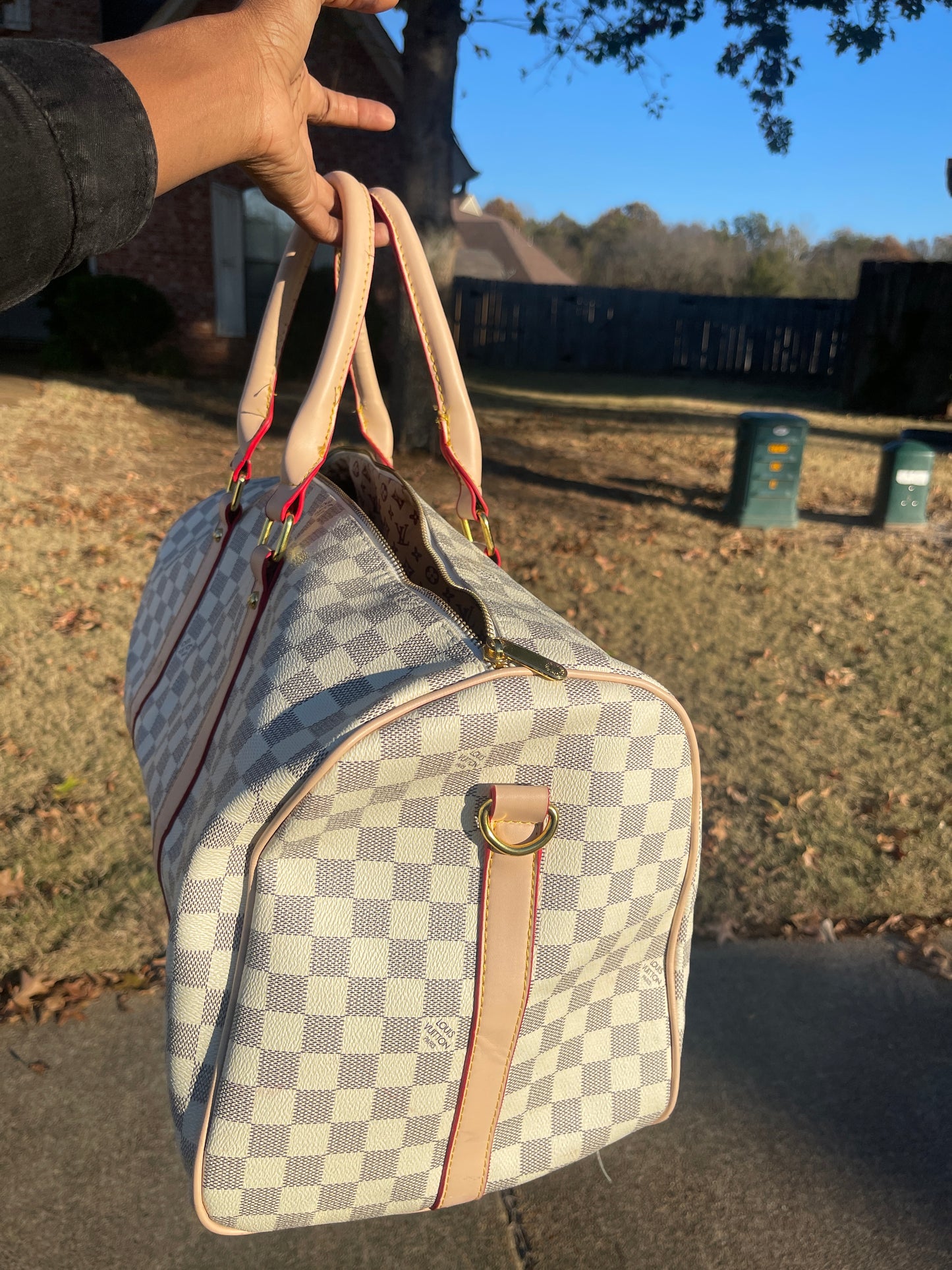 LV beige gray duffle bag