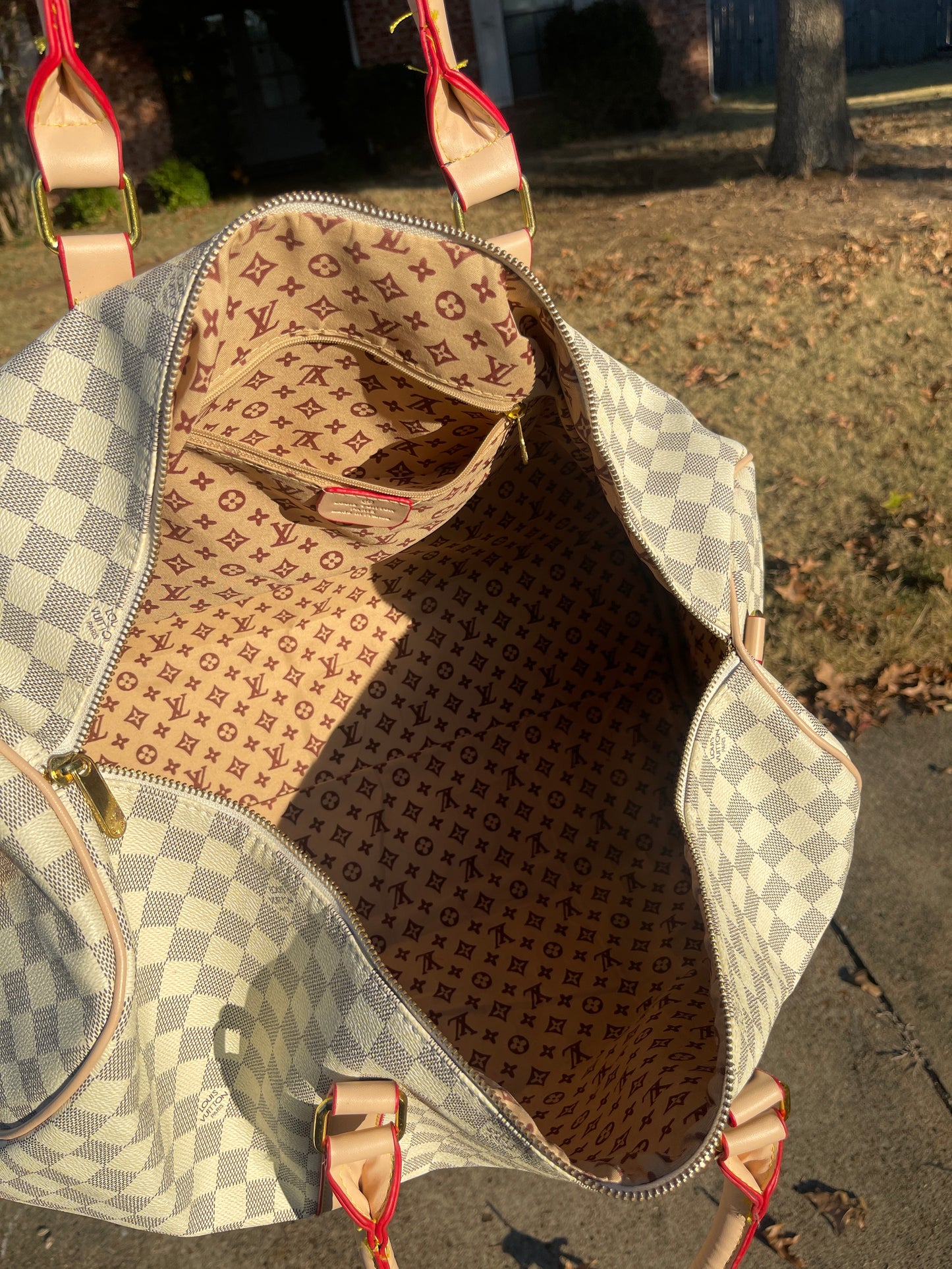 LV beige gray duffle bag