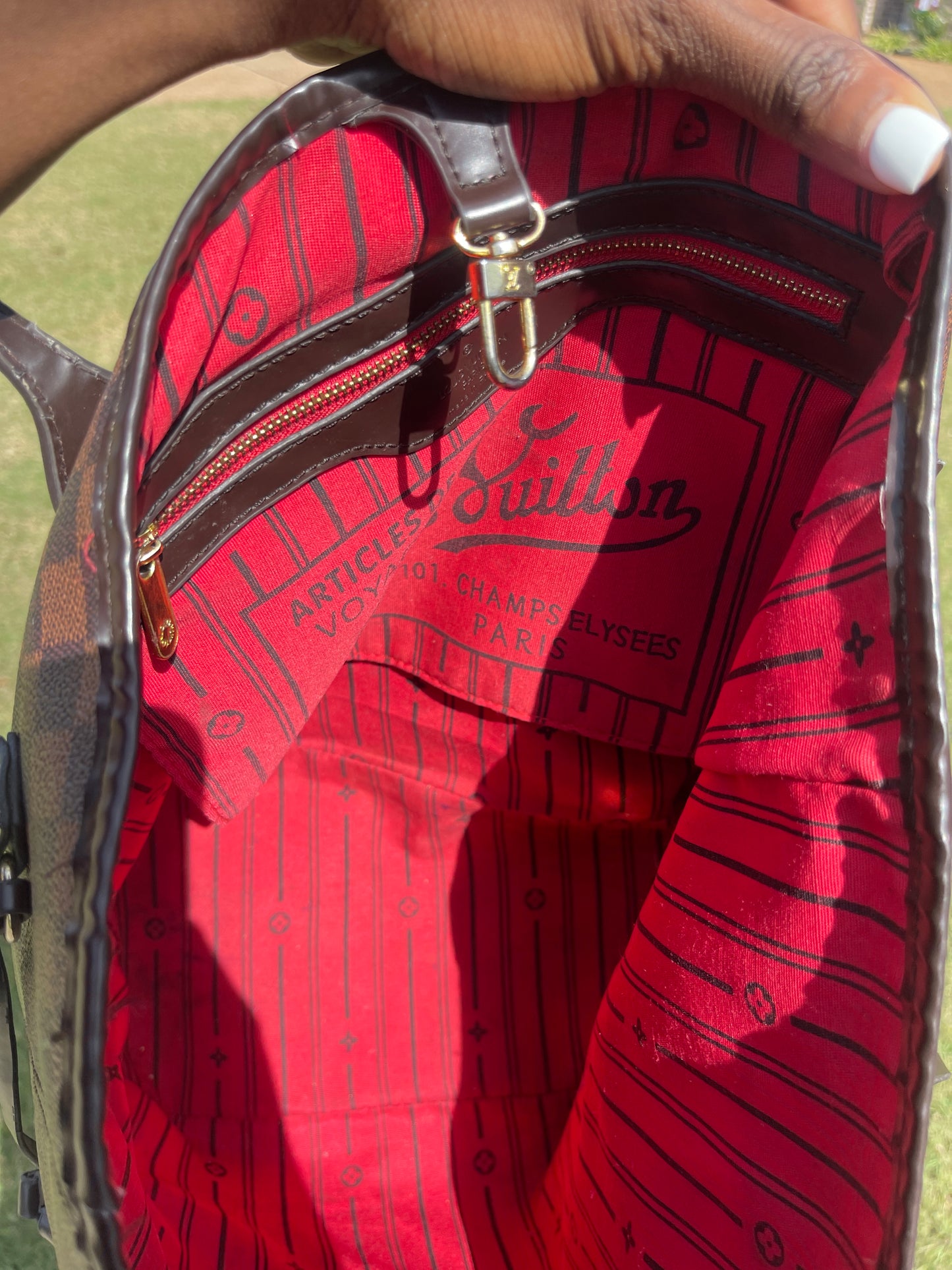 LV brown handbag