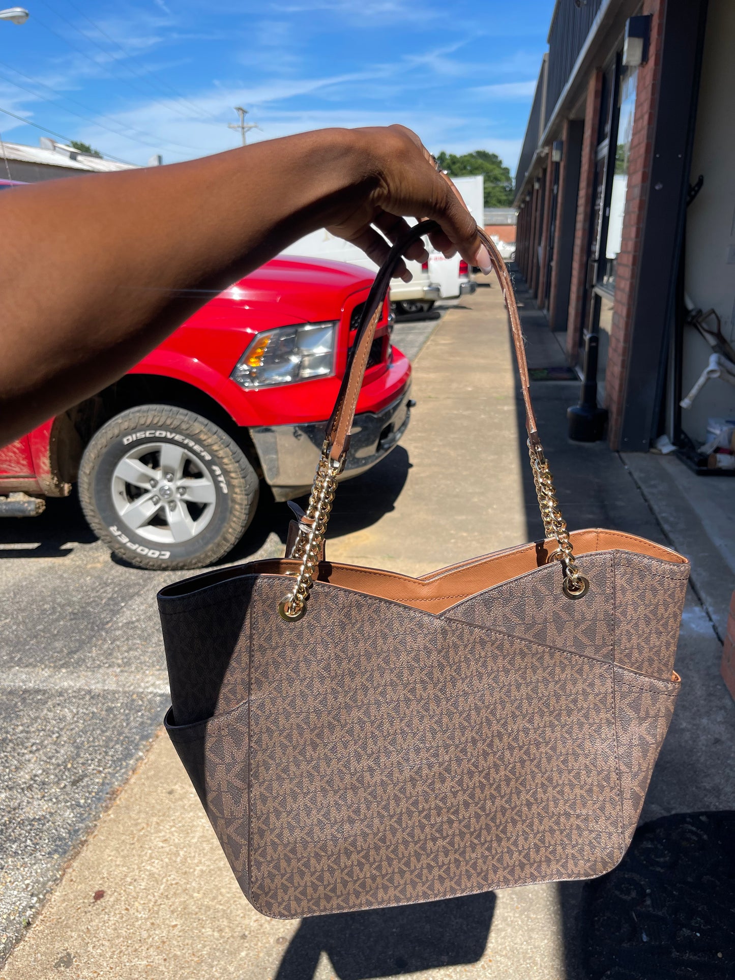 Michael kors brown handbag (light wear on strap)